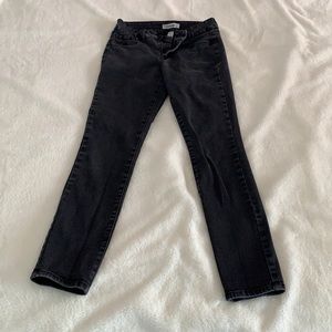 Mid-rise black skinny jeans
